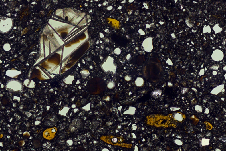 Close up plane-polarised view of sample 15427 Green Glass Clods from the Apollo 15 mission