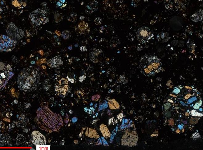 Thin section view of Dar Al Gani 225 meteorite between crossed polars