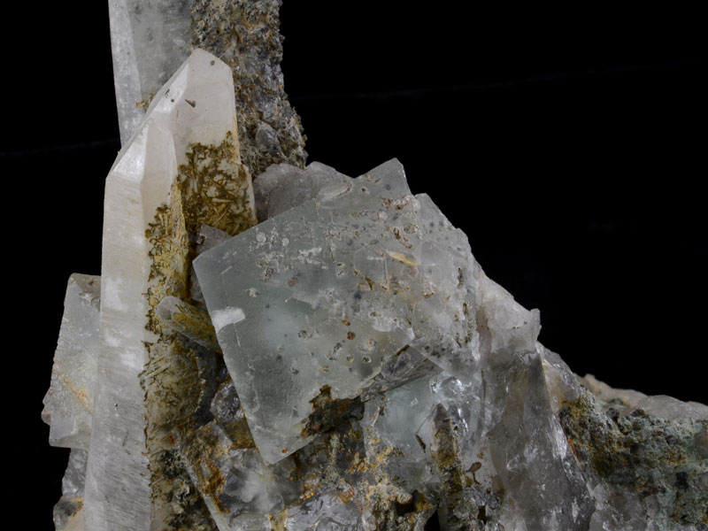 Fluorite octahedron on quartz cluster, 6.5 cm across